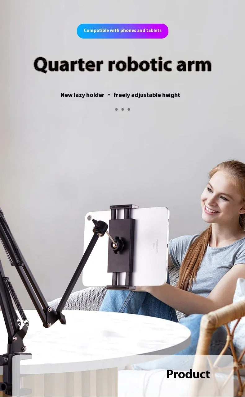 Black foldable metal desktop cantilever bracket holding a tablet, showing its adjustable arm and clip.