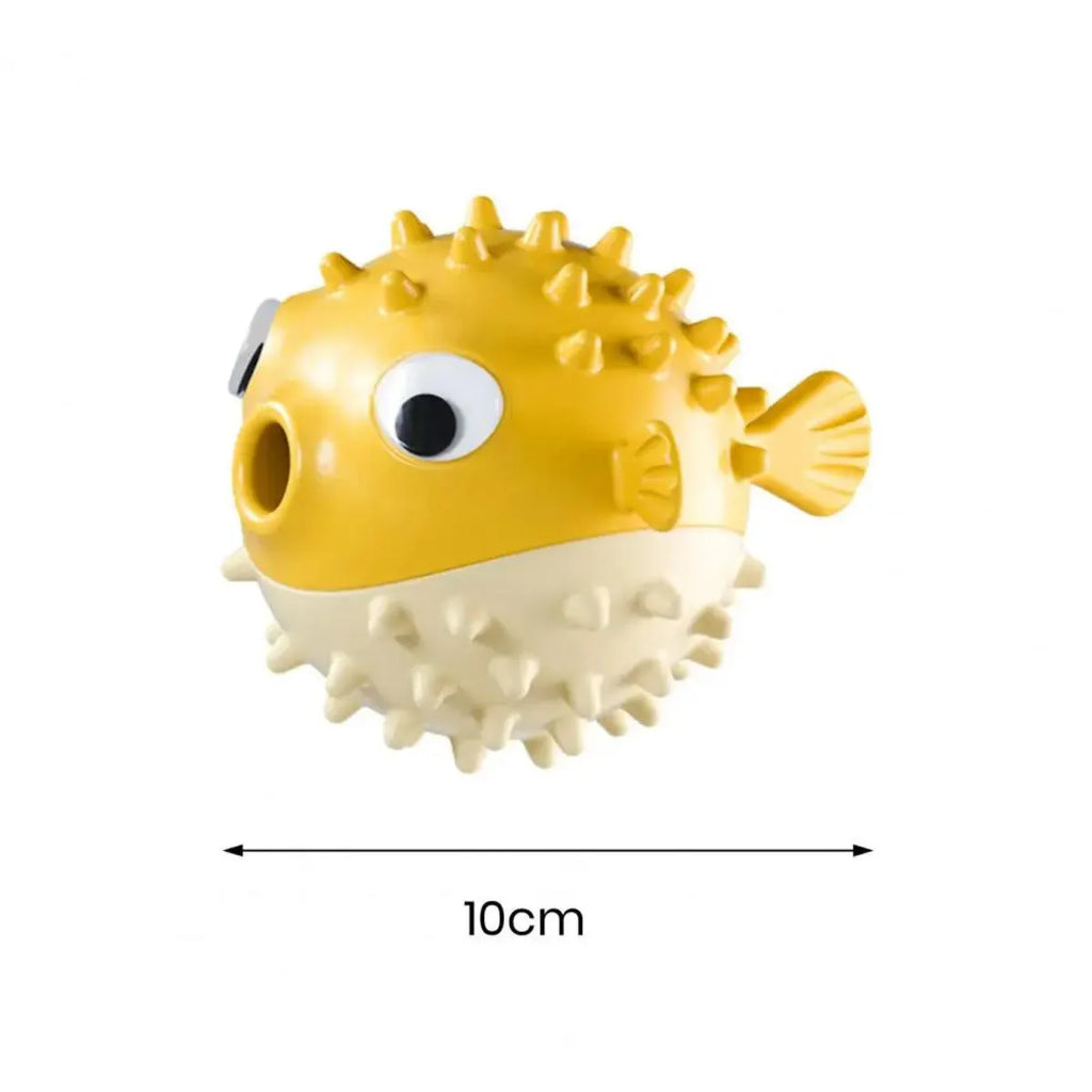 A yellow, fish-shaped durable dog chew toy with a textured surface and built-in squeaker.