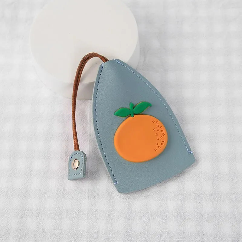 Colourful cartoon PU leather pull-out key case for car keys, shown open and closed
