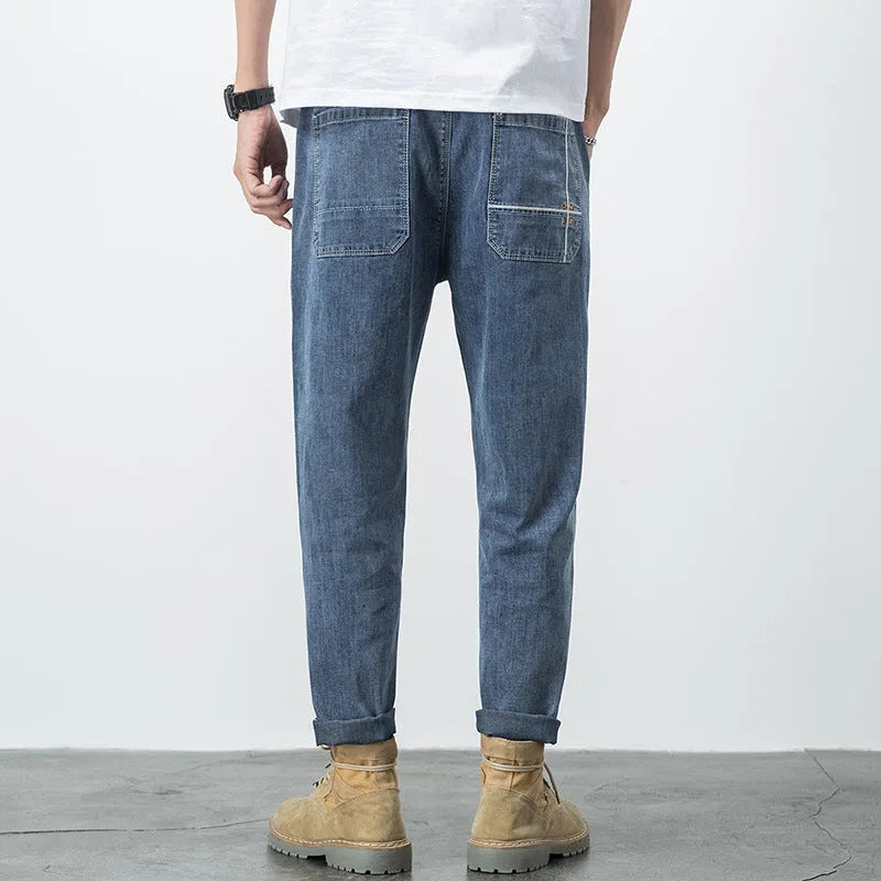 Men's loose plus size elastic waist straight leg jeans in blue denim
