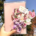 Handmade 3D butterfly birthday greeting card with artificial flowers, shown with its envelope.