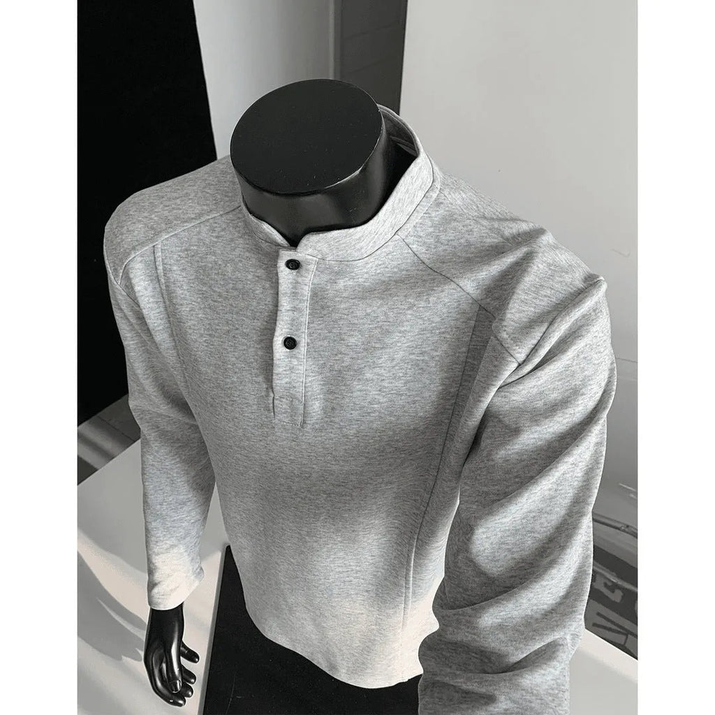 Men's loose-fit long sleeve polo shirt with an asymmetric design and stand-up collar in grey.