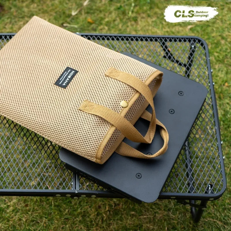 CLS aluminium folding camping stool shown in dual-use mode as a seat and small table with storage bag.