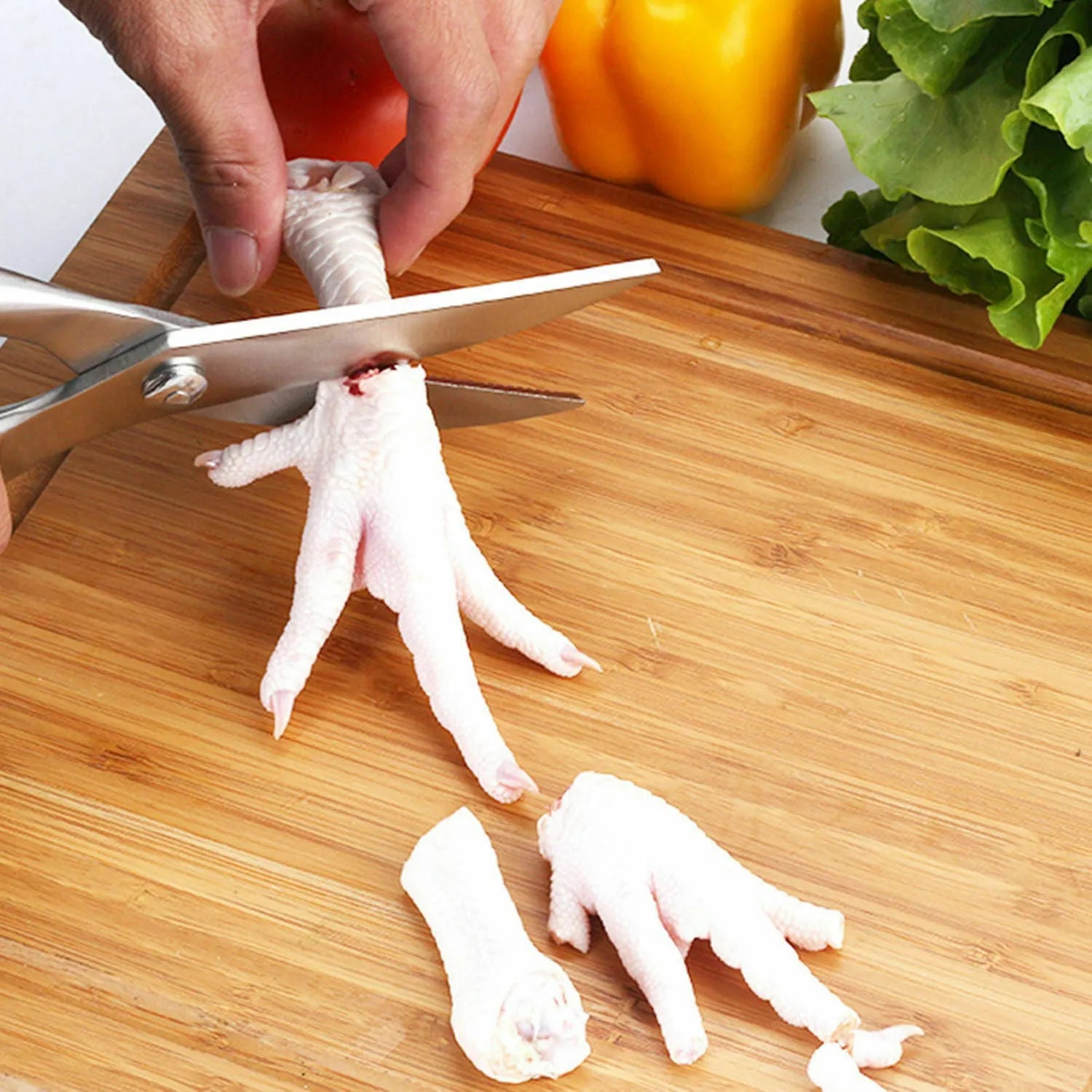 Silver stainless steel kitchen shears 25cm with serrated blade and ergonomic handle for cutting poultry bones
