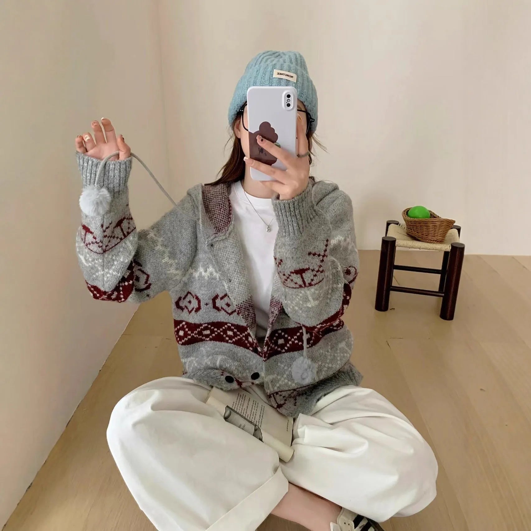 Women's geometric pattern brocade sweater coat in grey, loose fit with long sleeves.