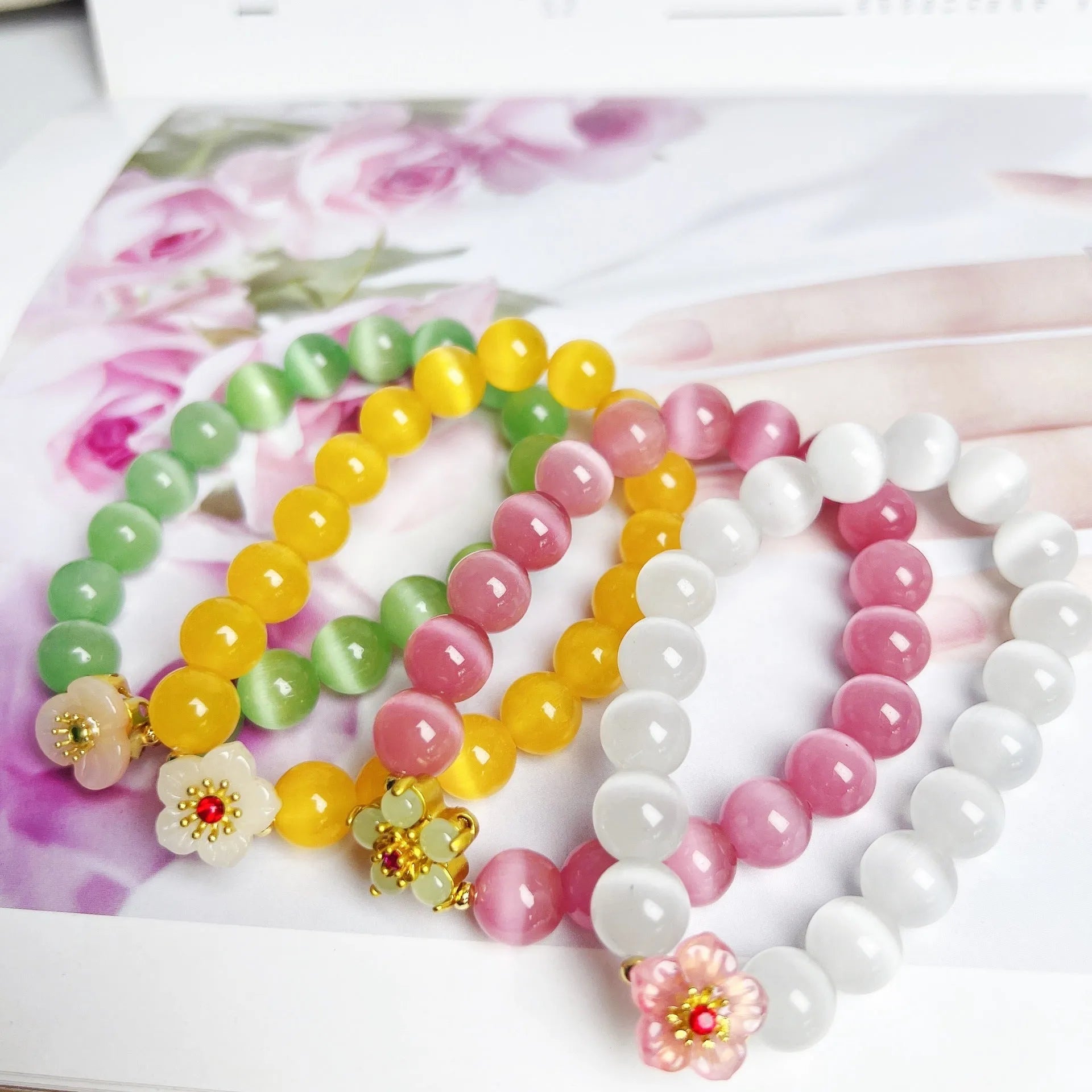 Handmade glass beaded bracelet with floral design in yellow, pink, white or green colour options