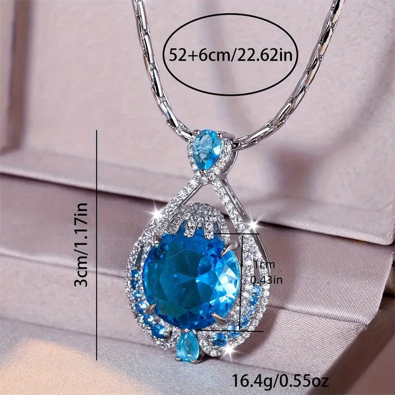 Women's geometric necklace with fireworks-cut blue gem pendant on water wave chain