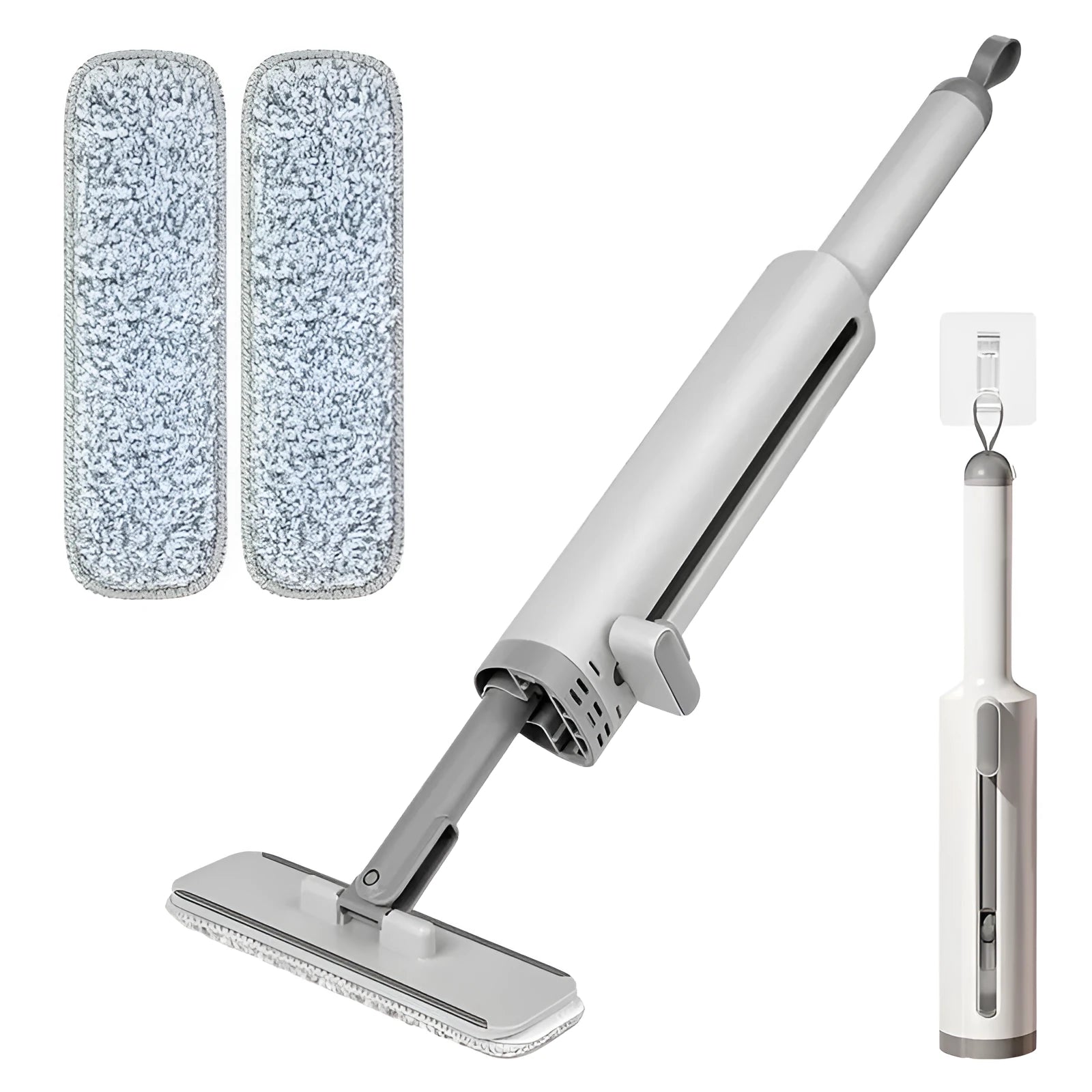 Pink self-squeezing rotatable mini flat mop with microfiber pad on a hardwood floor.