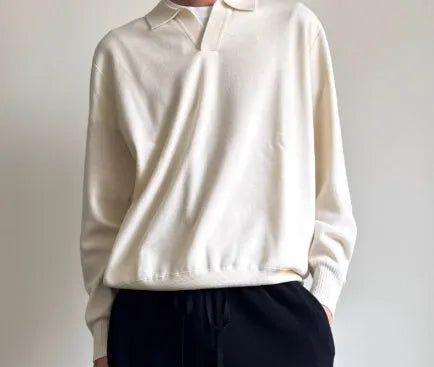 Man's pure wool polo sweater with a lapel collar in loose fit, shown in Milky White colour.