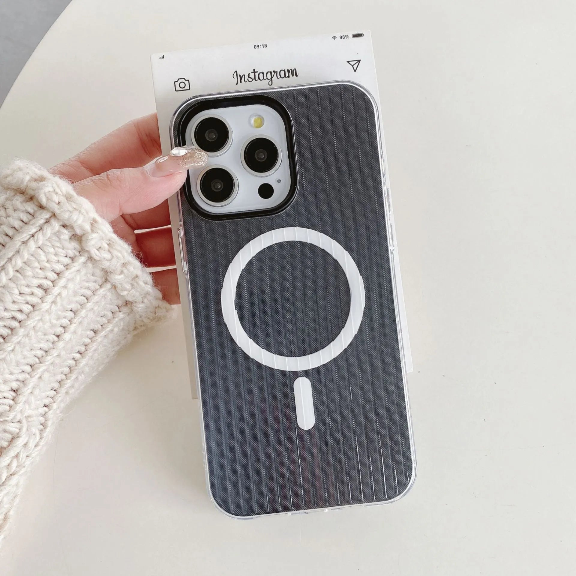 Magnetic stripe two-in-one TPU phone case in black with corrugated shell for iPhone 12 Pro