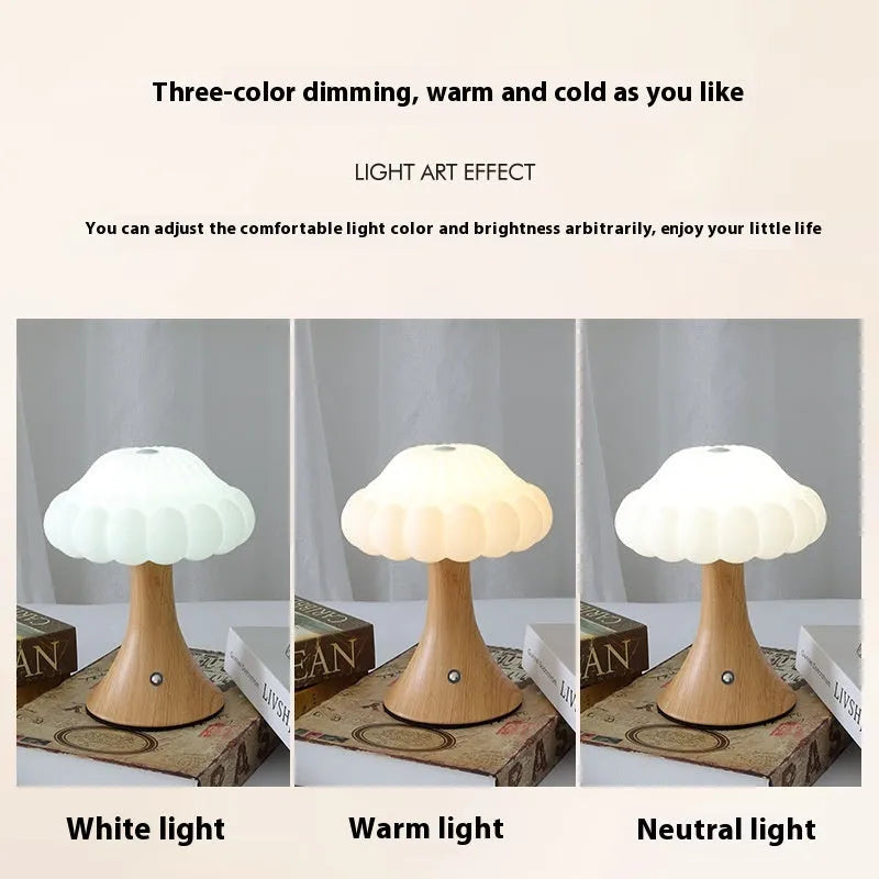 Small touch-controlled mushroom night lamp in wood grain colour on a table.