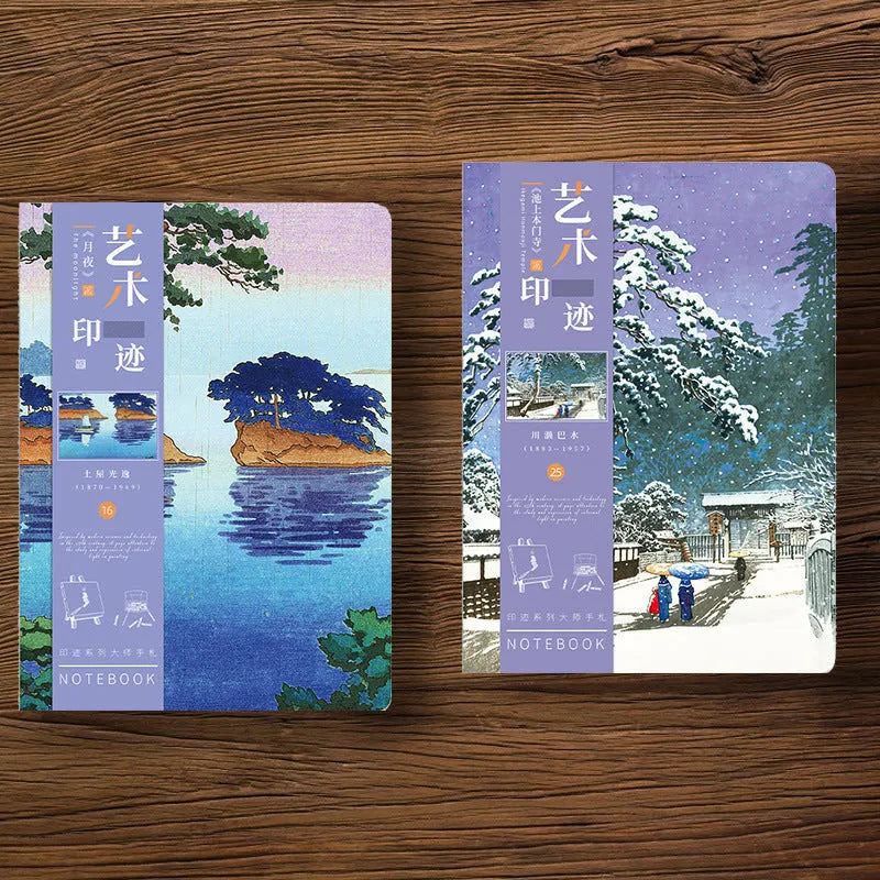 Hardcover Ukiyo-e art notebook open on a desk, showing the Kanagawa wave design and A5 size.