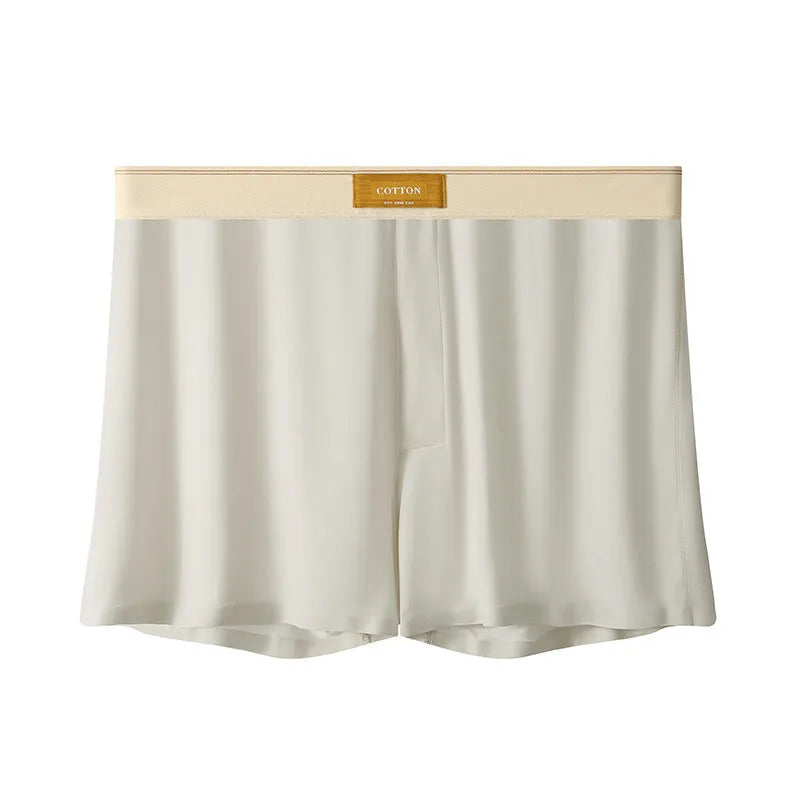 Men's solid colour loose fit ice silk underwear in a multi-pack on a grey background.