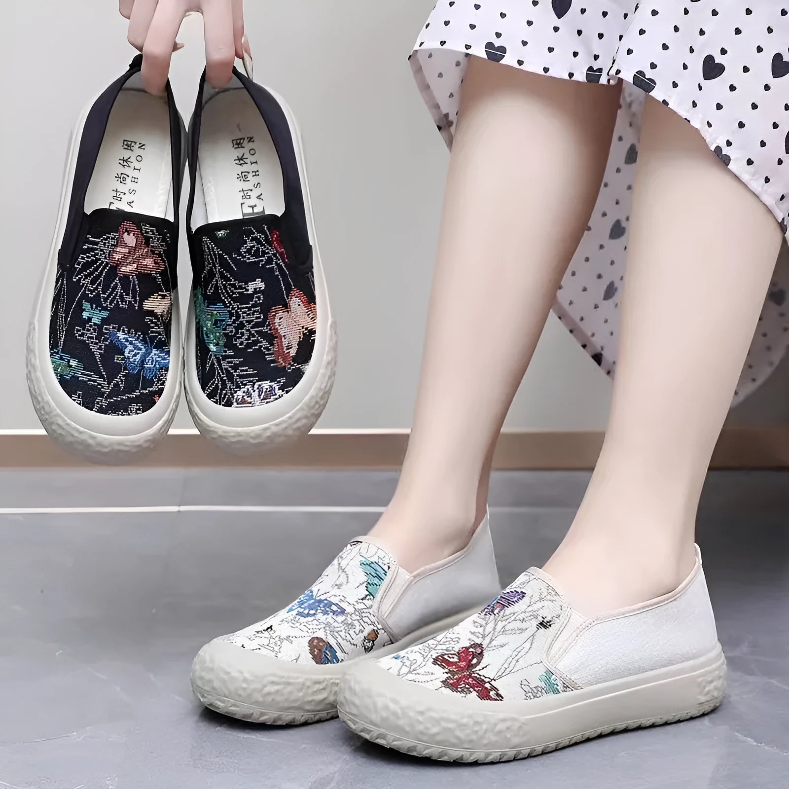 Women's Old Beijing slip-on canvas shoes in black with round toe and shallow mouth design on a white background.