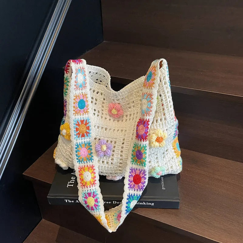 Women's woven beach shoulder bag in polyester with hollow knitted construction and single strap