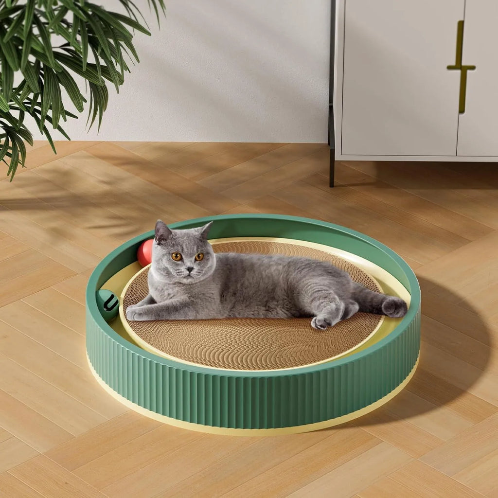 Large green circular cat scratching board with bell balls and replaceable cardboard core