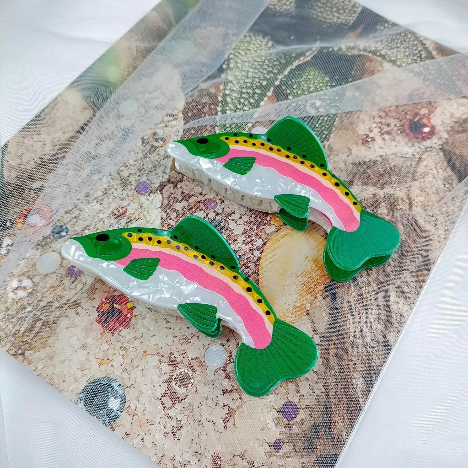 Dark green hair clip with detailed rainbow trout print on PVC material for marine enthusiasts
