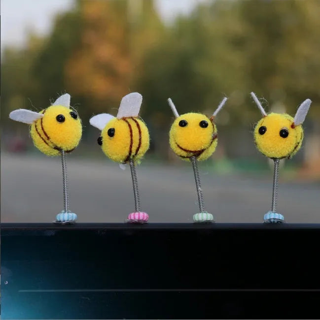 Swing Spring Bee car decoration with fur ball material and cartoon design measuring 3x3 cm