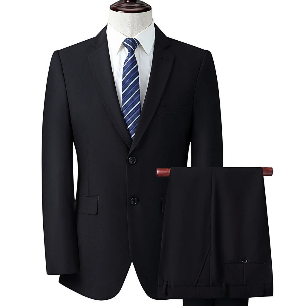 Men's slim fit business suit in black with coat and trousers on a hanger