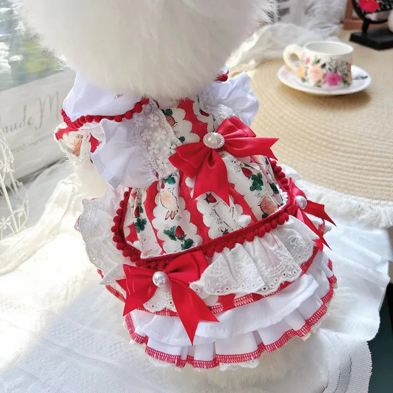 Small white dog wearing a rabbit skirt-style princess dress, showcasing the fit and lightweight polyester material.