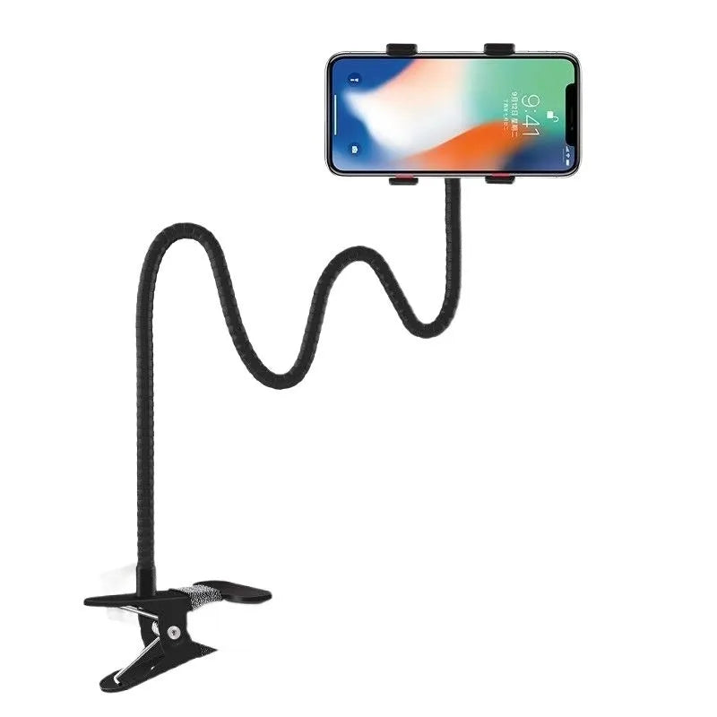 Black metal lazy stand gadget with rotary clip holding a mobile phone on a bedside table