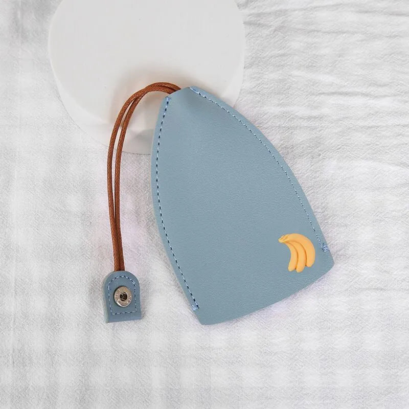 Colourful cartoon PU leather pull-out key case for car keys, shown open and closed