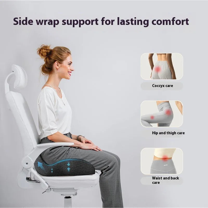Rectangular light grey memory foam seat cushion for an office chair.