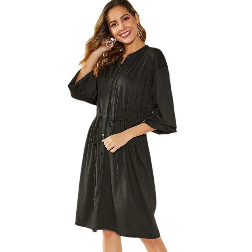 Black polyester A-line midi dress with long sleeves and a detachable belt.