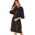 Black polyester A-line midi dress with long sleeves and a detachable belt.