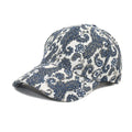 Blue paisley print polyester baseball cap with a dome crown, shown from the side.
