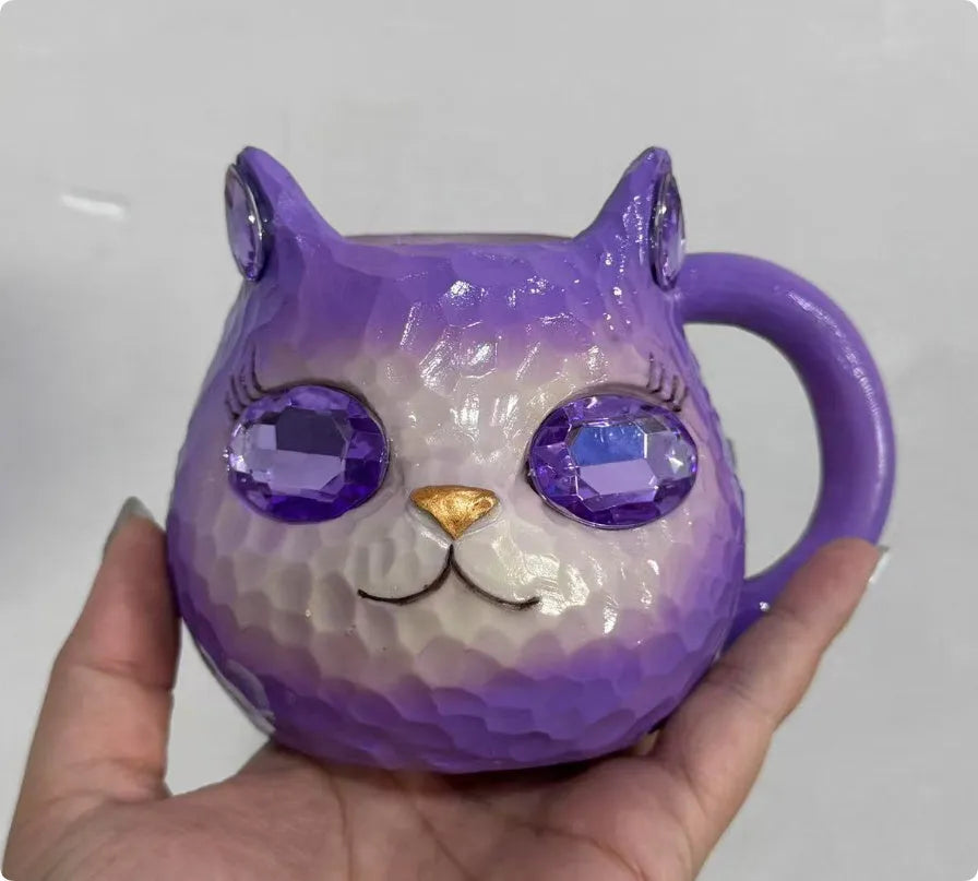 Resin Crystal Earth Cat Cup decorative ornament in purple, green, blue, and pink colour options.