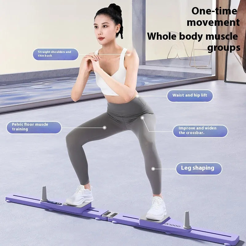 Split multifunctional skiing machine trainer in twilight purple on a wooden floor, showing its 85cm length and independent foot platforms.