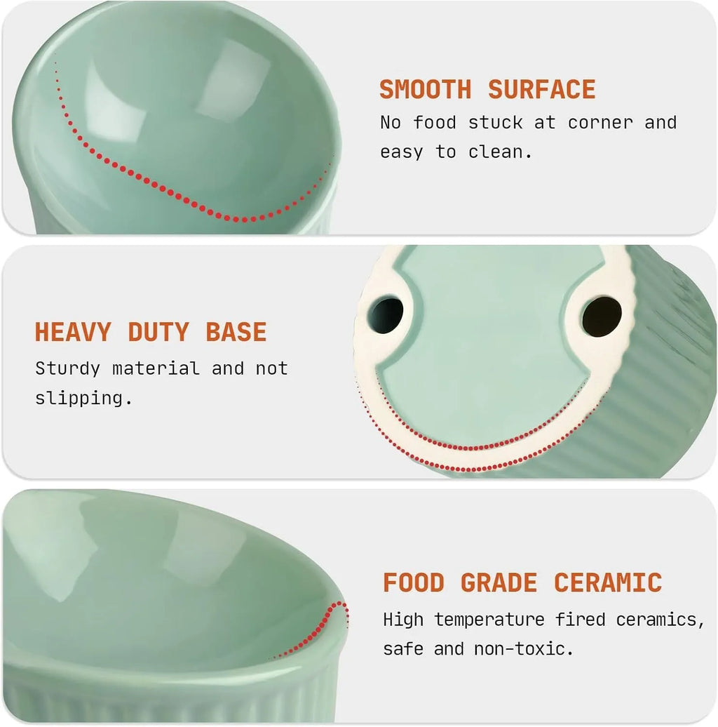 A ceramic elevated cat bowl with a tilted, round design shown in green, positioned on a floor.