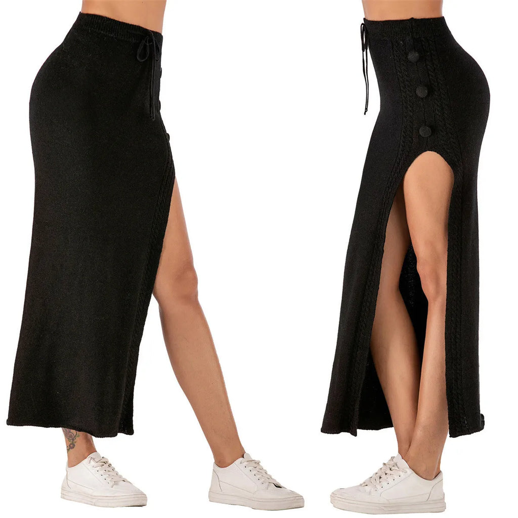 Women's black slim-fit acrylic mid-length skirt with side splits on a mannequin.