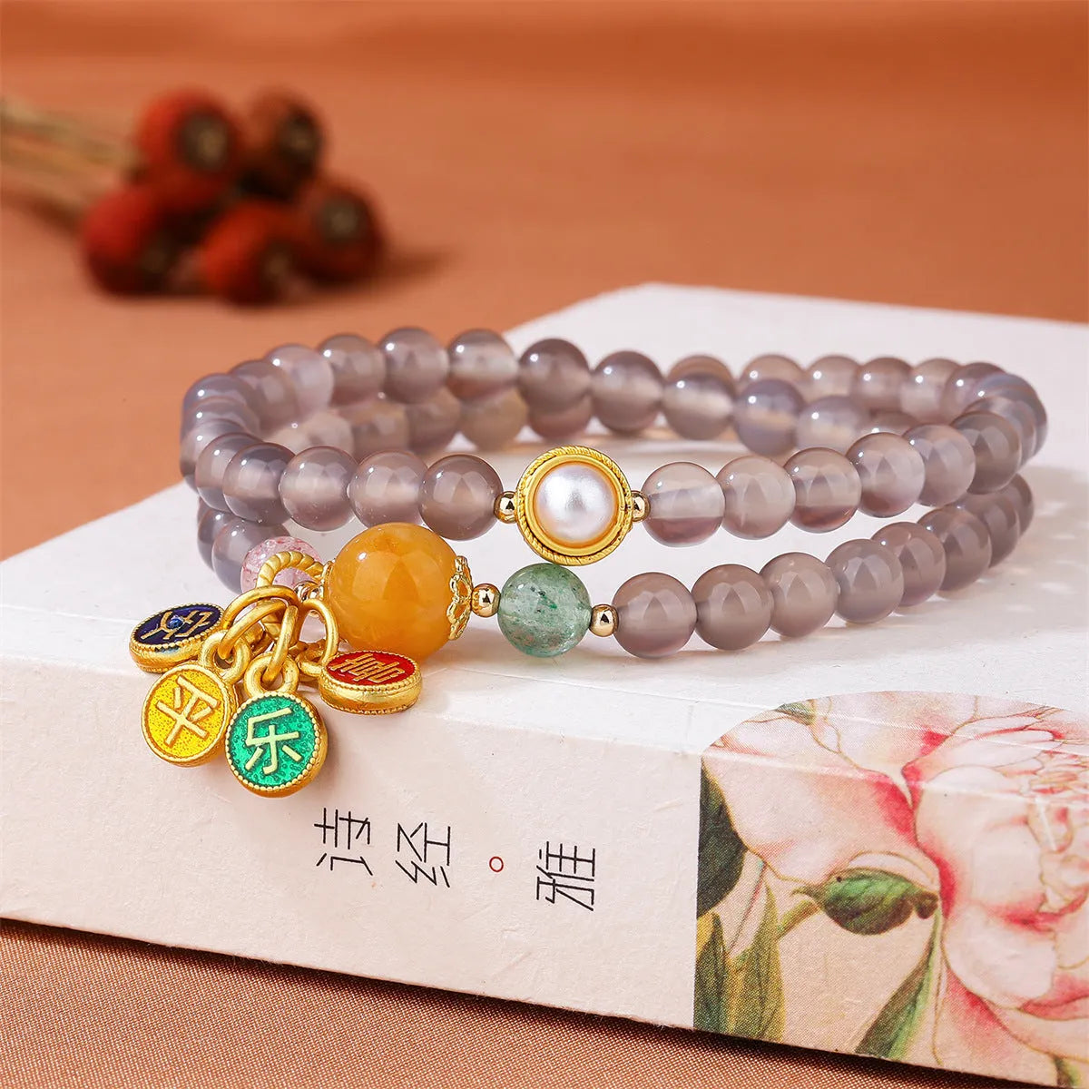 Natural grey agate bracelet with safe and happy motif, retro two-circle design on adjustable cord.