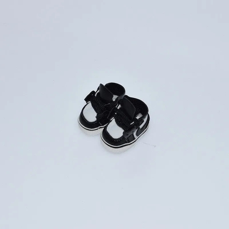 A pair of polyurethane doll shoe accessories for a 17cm figure, shown in a selected style and colour.