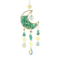 Moon-shaped K9 crystal car pendant on a metal base with a hanging chain.