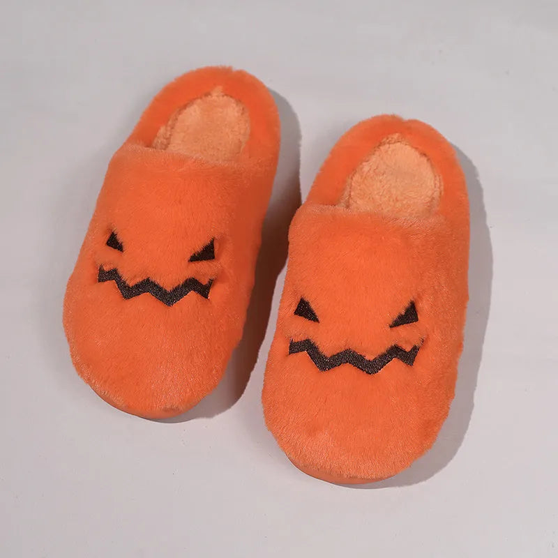 Orange coral velvet plush slippers with a non-slip PVC sole and fluffy lining.