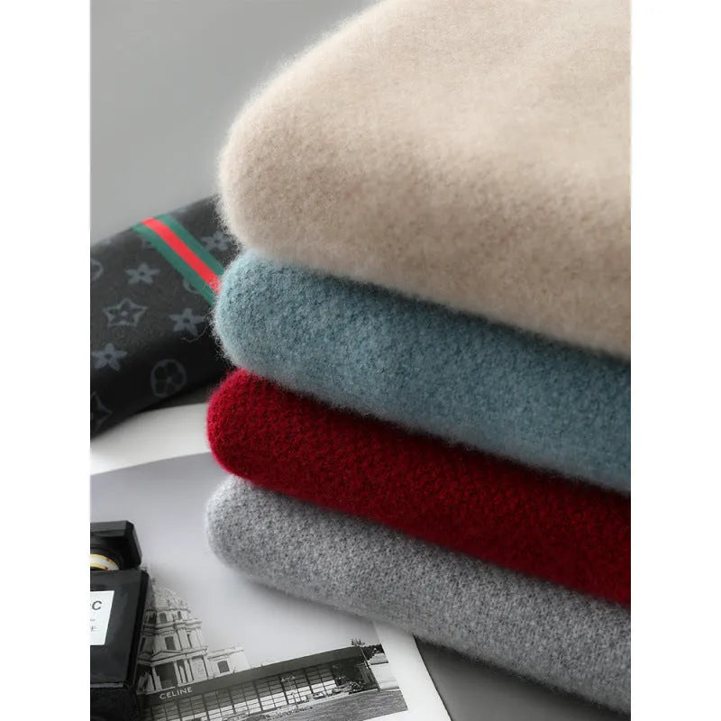 Slim-fit half-zip sheep wool sweater in grey, shown on a hanger.
