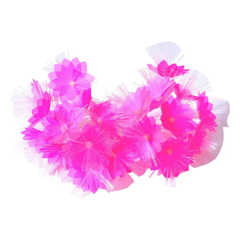 LED optical fibre flower light string with 20 warm white beads and battery box on a table decoration