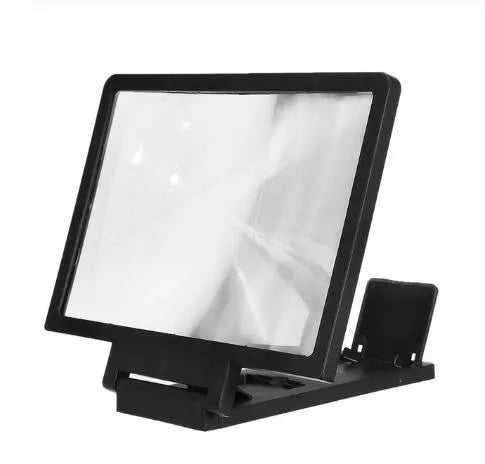 A black magnifying mobile phone stand holding a smartphone, showing the enlarged screen through the acrylic lens.