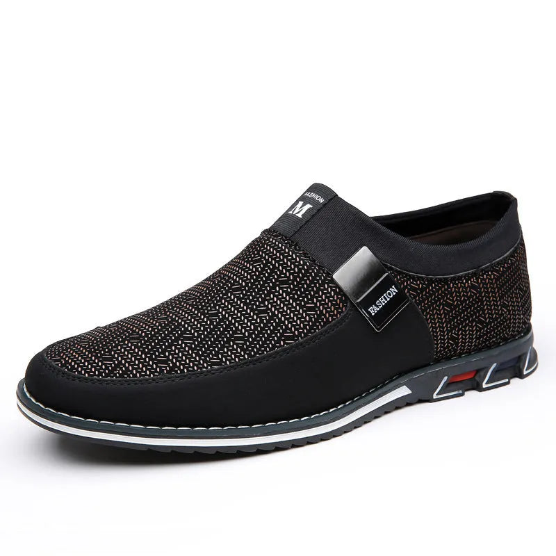 Men's grey and white synthetic leather slip-on loafers with a square toe and flat rubber sole.