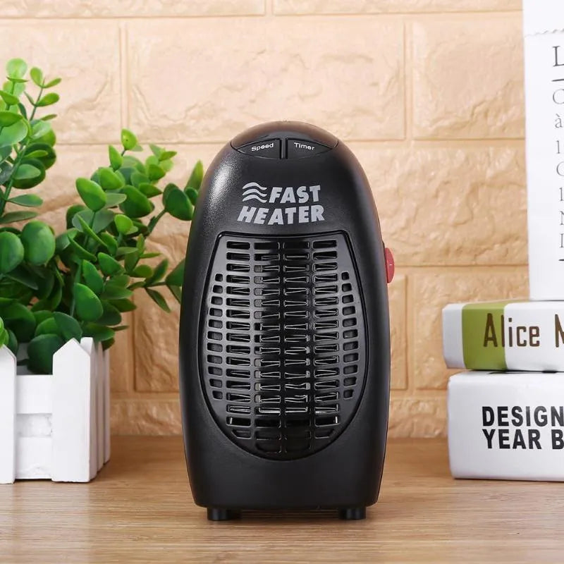 Black compact ceramic electric heater with digital display and a rotating plug on a white background.