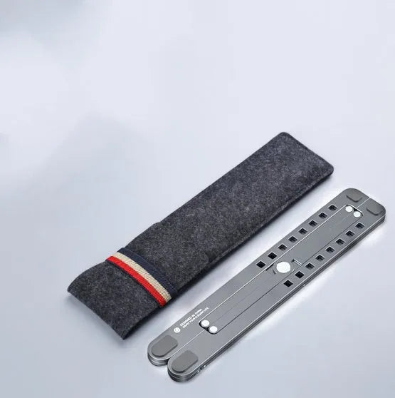 Aluminium foldable laptop stand in silver colour, shown open at an angle and folded flat.