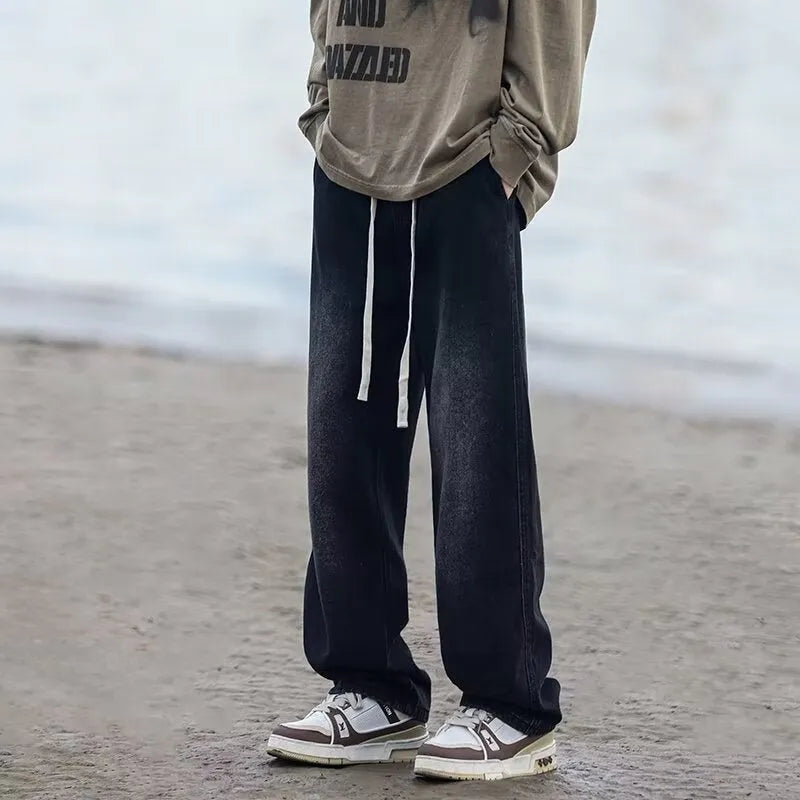 Men's straight-leg cotton denim trousers in blue with drawstring waist and loose fit