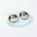 Blue plastic double-bowl pet food and water feeder tray with non-skid base.