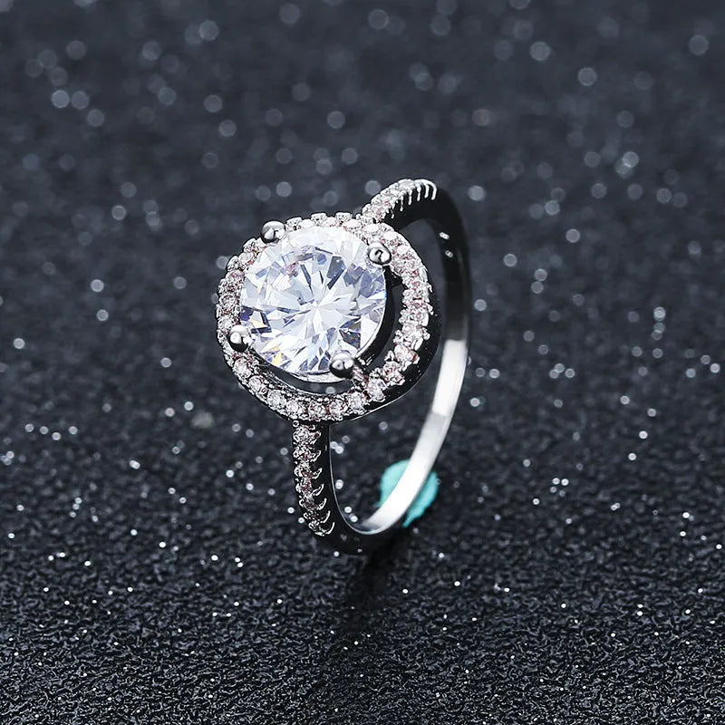 Zircon ring with paktong band in explosion of Europe style, available in sizes 5 to 10.