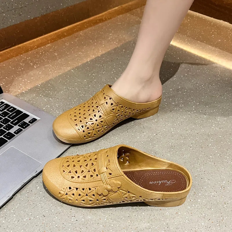 PVC flat toe box half slippers with hollow-out fairy style design in apricot colour.