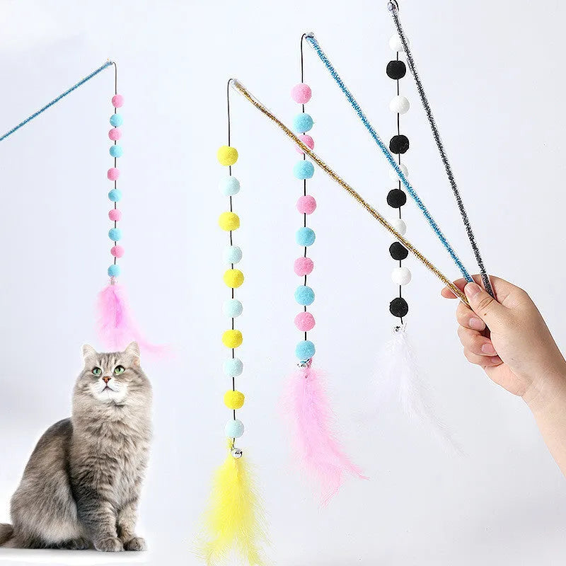 Cat toy teaser stick with plush ball and feathers, approximately 31 cm long, on a plain background.