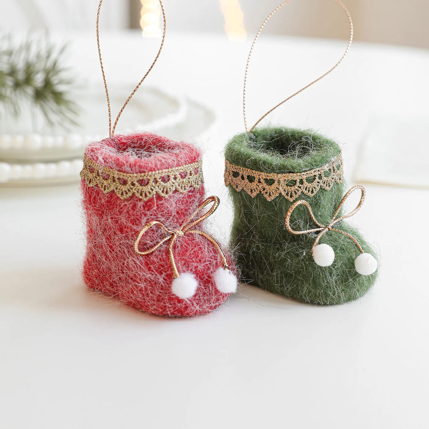 Plush fabric Christmas tree ornament shaped like a red boot with soft finish